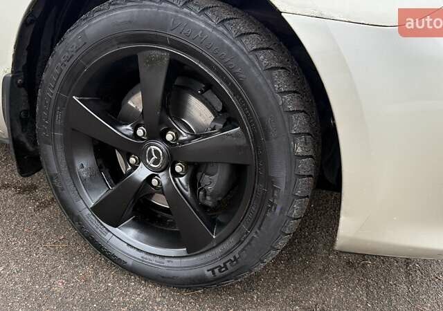 Бежевый Мазда 3, объемом двигателя 1.6 л и пробегом 262 тыс. км за 4250 $, фото 28 на Automoto.ua