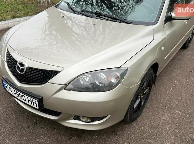 Бежевый Мазда 3, объемом двигателя 1.6 л и пробегом 262 тыс. км за 4250 $, фото 9 на Automoto.ua