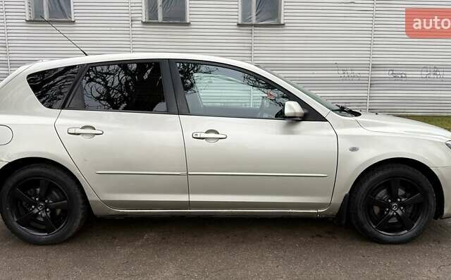 Бежевый Мазда 3, объемом двигателя 1.6 л и пробегом 262 тыс. км за 4250 $, фото 7 на Automoto.ua