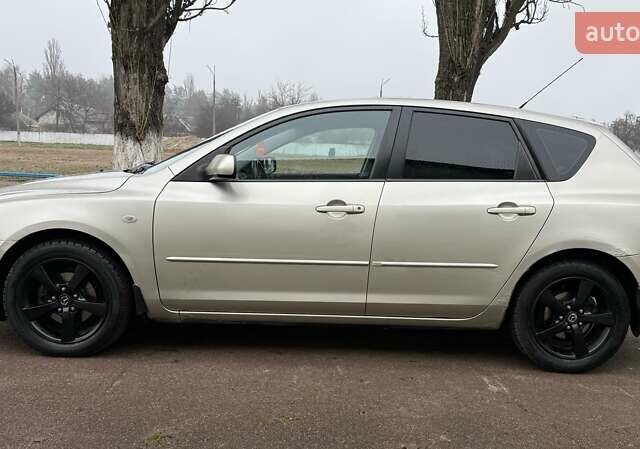 Бежевый Мазда 3, объемом двигателя 1.6 л и пробегом 262 тыс. км за 4250 $, фото 3 на Automoto.ua