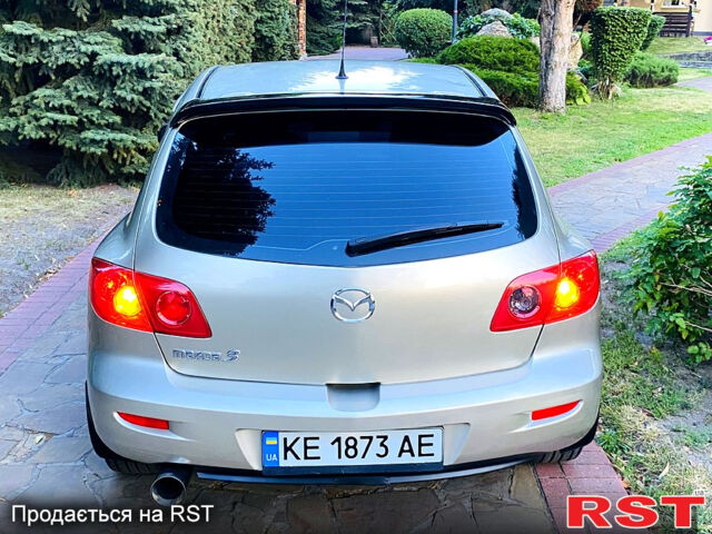 Бежевый Мазда 3, объемом двигателя 1.6 л и пробегом 180 тыс. км за 4750 $, фото 5 на Automoto.ua
