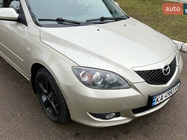 Бежевый Мазда 3, объемом двигателя 1.6 л и пробегом 262 тыс. км за 4250 $, фото 10 на Automoto.ua