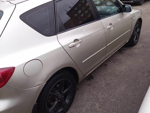 Бежевий Мазда 3, об'ємом двигуна 1.6 л та пробігом 265 тис. км за 3350 $, фото 5 на Automoto.ua