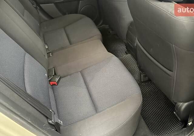 Бежевый Мазда 3, объемом двигателя 1.6 л и пробегом 262 тыс. км за 4250 $, фото 21 на Automoto.ua