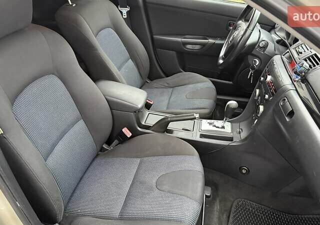 Бежевый Мазда 3, объемом двигателя 1.6 л и пробегом 262 тыс. км за 4250 $, фото 24 на Automoto.ua