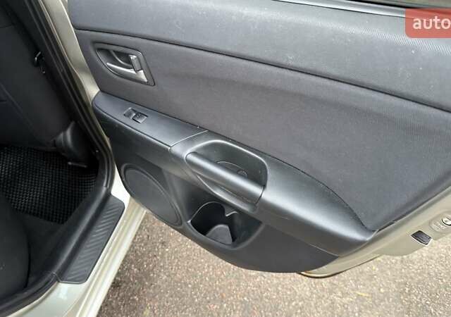 Бежевый Мазда 3, объемом двигателя 1.6 л и пробегом 262 тыс. км за 4250 $, фото 20 на Automoto.ua