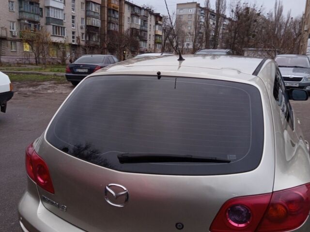 Бежевий Мазда 3, об'ємом двигуна 1.6 л та пробігом 265 тис. км за 3350 $, фото 4 на Automoto.ua