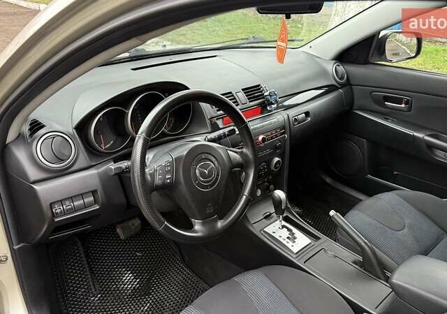 Бежевый Мазда 3, объемом двигателя 1.6 л и пробегом 262 тыс. км за 4250 $, фото 12 на Automoto.ua