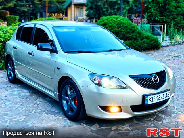 Бежевый Мазда 3, объемом двигателя 1.6 л и пробегом 180 тыс. км за 4750 $, фото 6 на Automoto.ua