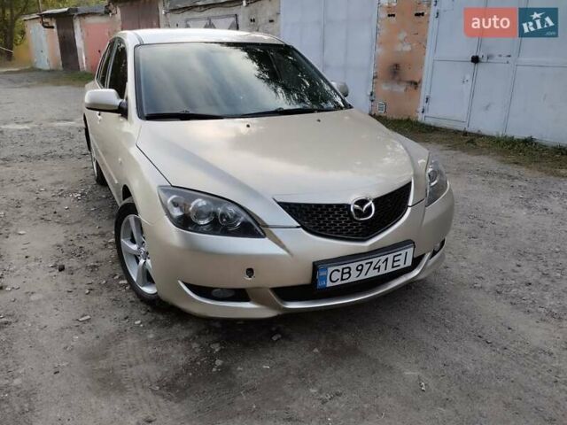 Бежевий Мазда 3, об'ємом двигуна 1.6 л та пробігом 250 тис. км за 4550 $, фото 7 на Automoto.ua