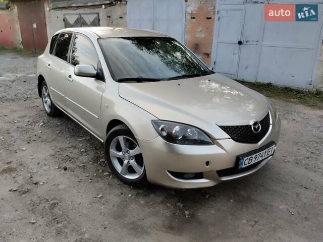Бежевий Мазда 3, об'ємом двигуна 1.6 л та пробігом 250 тис. км за 4550 $, фото 5 на Automoto.ua