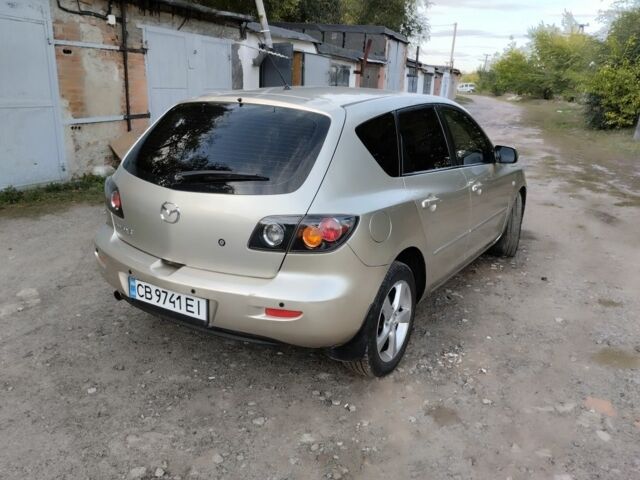Бежевый Мазда 3, объемом двигателя 1.6 л и пробегом 250 тыс. км за 4550 $, фото 4 на Automoto.ua
