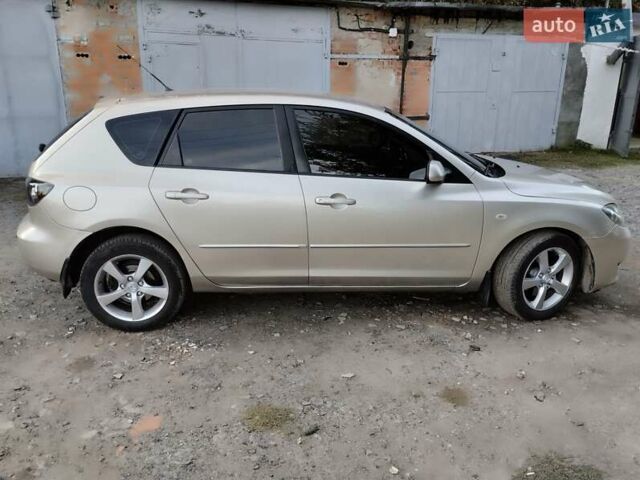 Бежевий Мазда 3, об'ємом двигуна 1.6 л та пробігом 250 тис. км за 4550 $, фото 3 на Automoto.ua