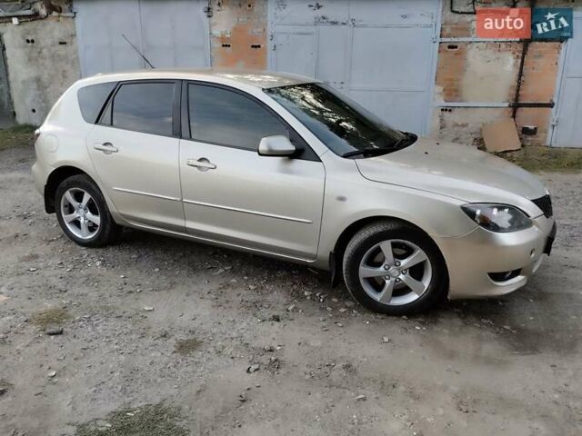 Бежевий Мазда 3, об'ємом двигуна 1.6 л та пробігом 250 тис. км за 4550 $, фото 6 на Automoto.ua