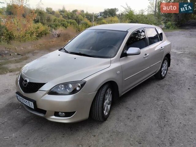 Бежевий Мазда 3, об'ємом двигуна 1.6 л та пробігом 250 тис. км за 4550 $, фото 4 на Automoto.ua