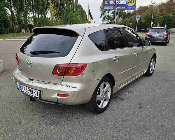 Бежевый Мазда 3, объемом двигателя 1.6 л и пробегом 250 тыс. км за 3000 $, фото 3 на Automoto.ua