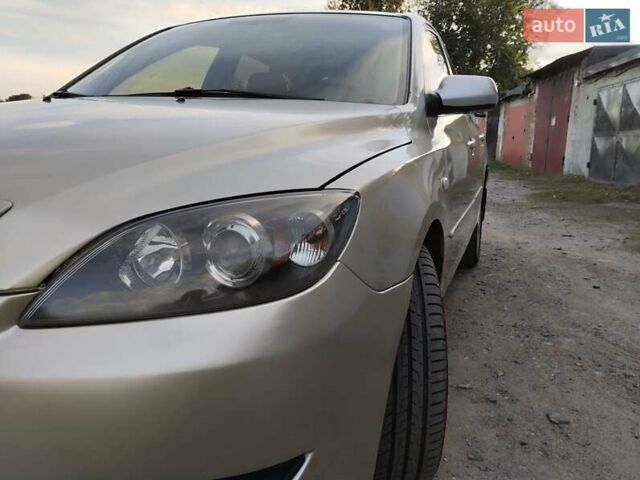 Бежевий Мазда 3, об'ємом двигуна 1.6 л та пробігом 250 тис. км за 4550 $, фото 15 на Automoto.ua
