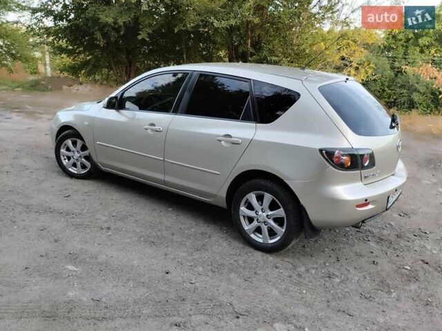 Бежевий Мазда 3, об'ємом двигуна 1.6 л та пробігом 250 тис. км за 4550 $, фото 1 на Automoto.ua