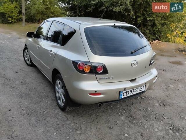 Бежевий Мазда 3, об'ємом двигуна 1.6 л та пробігом 250 тис. км за 4550 $, фото 9 на Automoto.ua