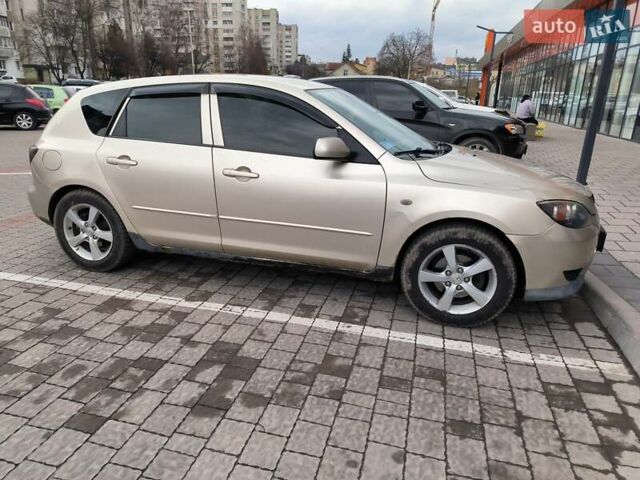 Бежевый Мазда 3, объемом двигателя 1.6 л и пробегом 158 тыс. км за 4500 $, фото 4 на Automoto.ua