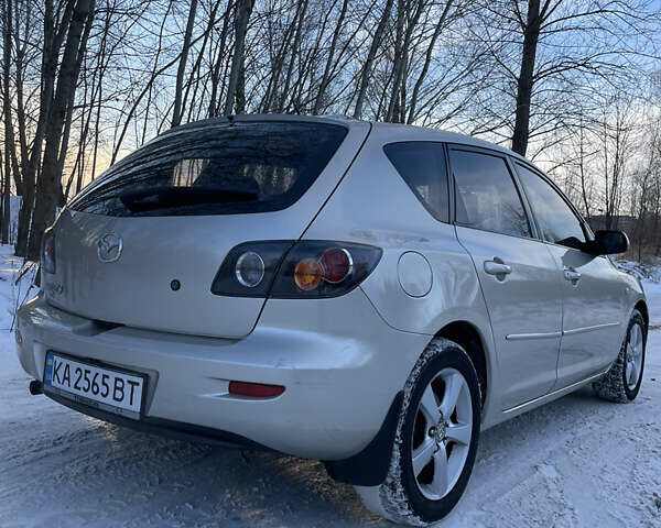 Бежевый Мазда 3, объемом двигателя 1.6 л и пробегом 170 тыс. км за 5200 $, фото 4 на Automoto.ua