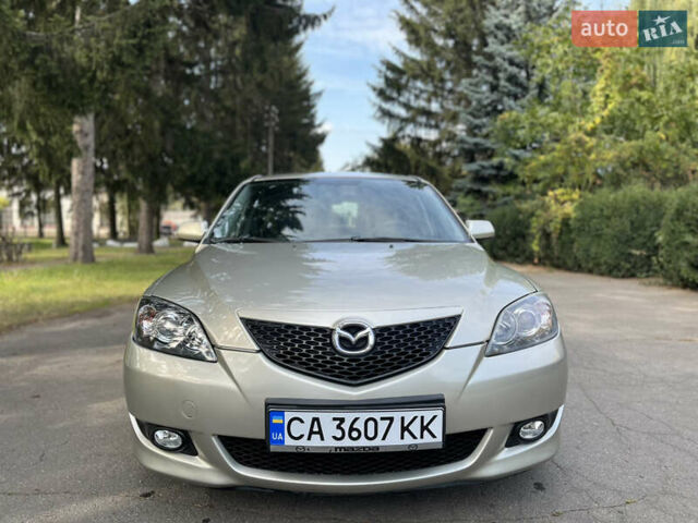 Бежевый Мазда 3, объемом двигателя 1.6 л и пробегом 186 тыс. км за 5200 $, фото 12 на Automoto.ua