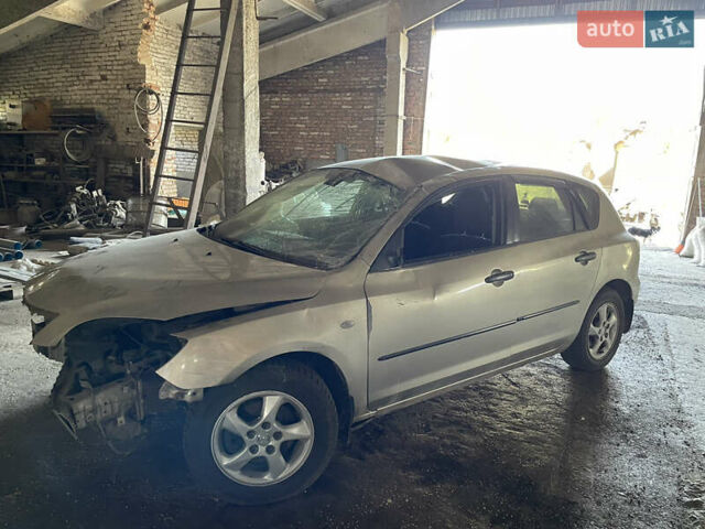 Бежевый Мазда 3, объемом двигателя 1.6 л и пробегом 225 тыс. км за 1600 $, фото 10 на Automoto.ua