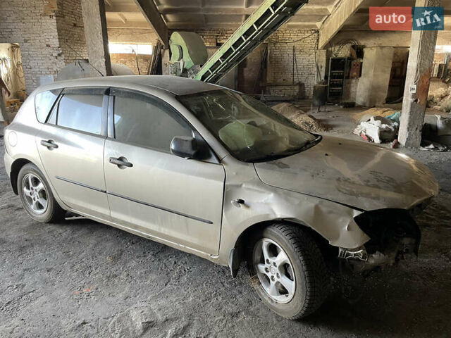 Бежевый Мазда 3, объемом двигателя 1.6 л и пробегом 225 тыс. км за 1600 $, фото 3 на Automoto.ua