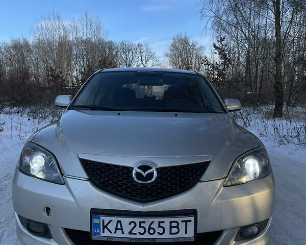 Бежевый Мазда 3, объемом двигателя 1.6 л и пробегом 170 тыс. км за 5200 $, фото 1 на Automoto.ua