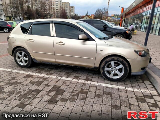 Бежевый Мазда 3, объемом двигателя 1.6 л и пробегом 157 тыс. км за 4500 $, фото 2 на Automoto.ua