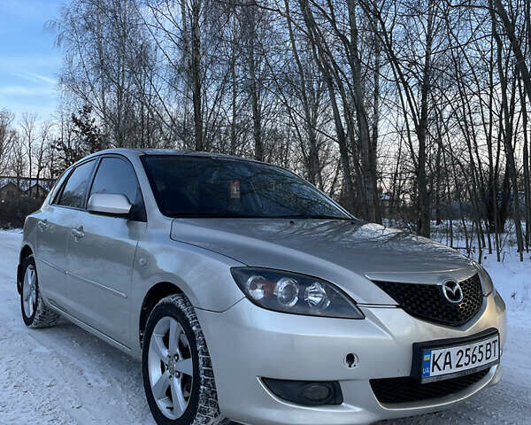 Бежевый Мазда 3, объемом двигателя 1.6 л и пробегом 170 тыс. км за 5200 $, фото 5 на Automoto.ua