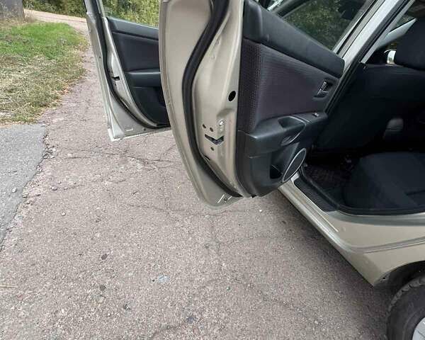 Бежевий Мазда 3, об'ємом двигуна 1.6 л та пробігом 250 тис. км за 4600 $, фото 13 на Automoto.ua