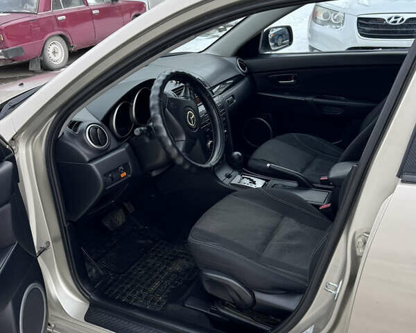 Бежевий Мазда 3, об'ємом двигуна 1.6 л та пробігом 230 тис. км за 5300 $, фото 7 на Automoto.ua