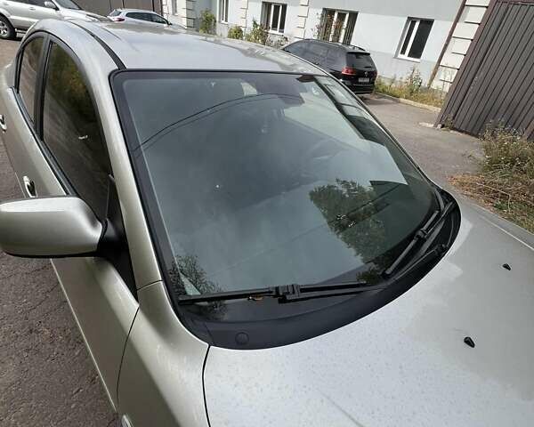 Бежевий Мазда 3, об'ємом двигуна 1.6 л та пробігом 250 тис. км за 4600 $, фото 6 на Automoto.ua