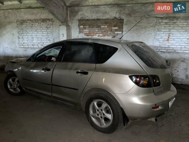 Бежевый Мазда 3, объемом двигателя 1.6 л и пробегом 225 тыс. км за 1600 $, фото 21 на Automoto.ua