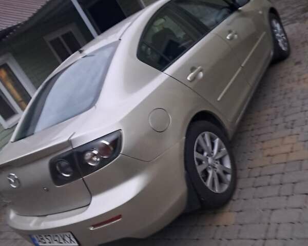 Бежевый Мазда 3, объемом двигателя 1.6 л и пробегом 249 тыс. км за 3500 $, фото 1 на Automoto.ua