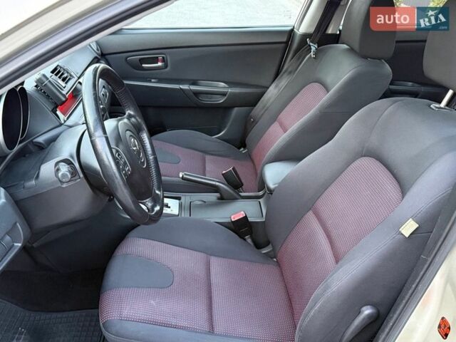 Бежевый Мазда 3, объемом двигателя 1.6 л и пробегом 170 тыс. км за 5000 $, фото 16 на Automoto.ua