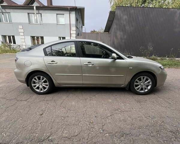 Бежевий Мазда 3, об'ємом двигуна 1.6 л та пробігом 250 тис. км за 4600 $, фото 5 на Automoto.ua