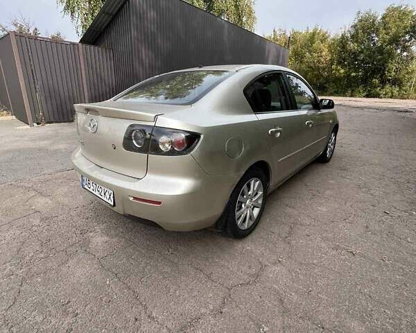 Бежевий Мазда 3, об'ємом двигуна 1.6 л та пробігом 250 тис. км за 4600 $, фото 3 на Automoto.ua