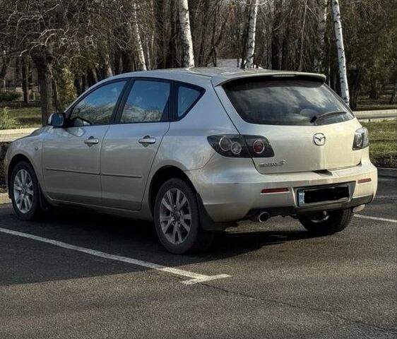 Бежевый Мазда 3, объемом двигателя 1.6 л и пробегом 290 тыс. км за 5800 $, фото 1 на Automoto.ua