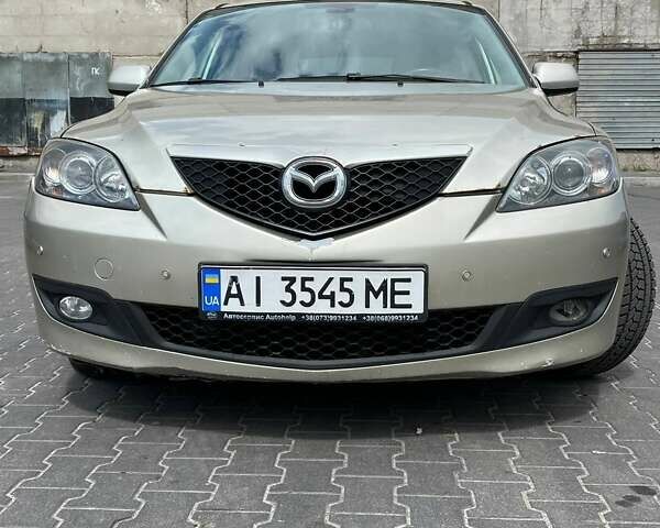 Бежевий Мазда 3, об'ємом двигуна 1.6 л та пробігом 243 тис. км за 5100 $, фото 8 на Automoto.ua