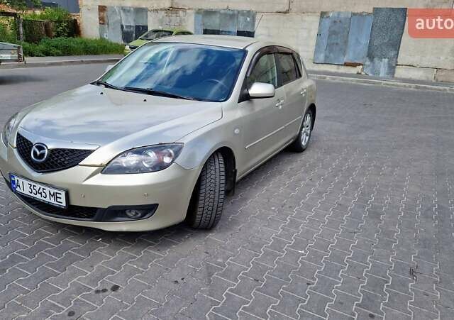 Бежевий Мазда 3, об'ємом двигуна 1.6 л та пробігом 243 тис. км за 5100 $, фото 7 на Automoto.ua