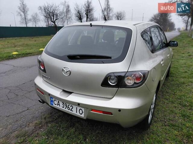 Бежевый Мазда 3, объемом двигателя 1.6 л и пробегом 230 тыс. км за 5200 $, фото 3 на Automoto.ua