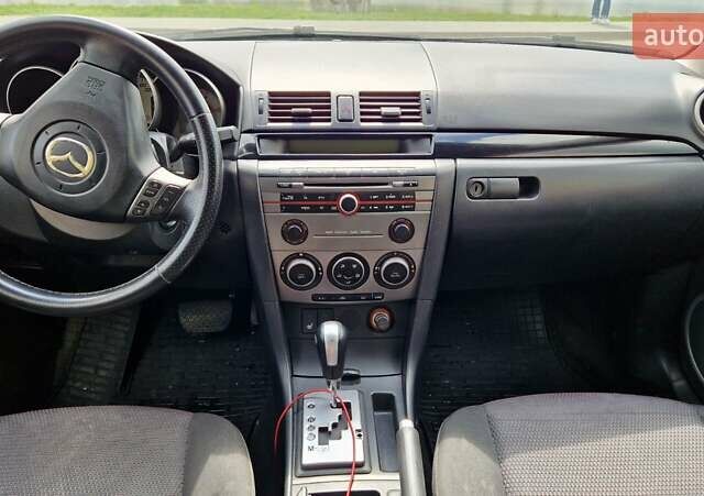 Бежевий Мазда 3, об'ємом двигуна 1.6 л та пробігом 243 тис. км за 5100 $, фото 2 на Automoto.ua