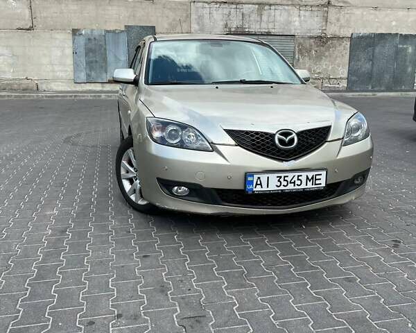 Бежевий Мазда 3, об'ємом двигуна 1.6 л та пробігом 243 тис. км за 5100 $, фото 1 на Automoto.ua
