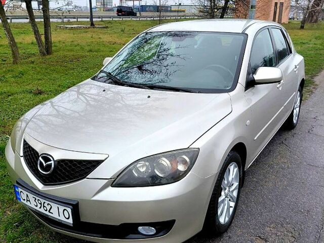 Бежевый Мазда 3, объемом двигателя 1.6 л и пробегом 230 тыс. км за 5200 $, фото 1 на Automoto.ua