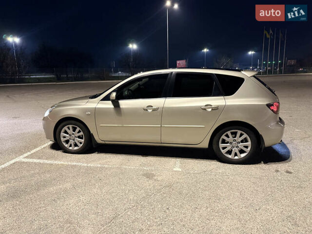 Бежевый Мазда 3, объемом двигателя 1.6 л и пробегом 196 тыс. км за 5700 $, фото 1 на Automoto.ua