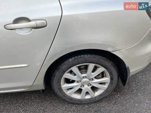 Бежевий Мазда 3, об'ємом двигуна 2 л та пробігом 275 тис. км за 7000 $, фото 7 на Automoto.ua