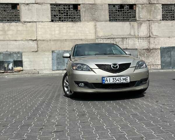 Бежевий Мазда 3, об'ємом двигуна 1.6 л та пробігом 243 тис. км за 5100 $, фото 4 на Automoto.ua