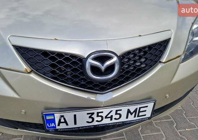 Бежевий Мазда 3, об'ємом двигуна 1.6 л та пробігом 243 тис. км за 5100 $, фото 9 на Automoto.ua